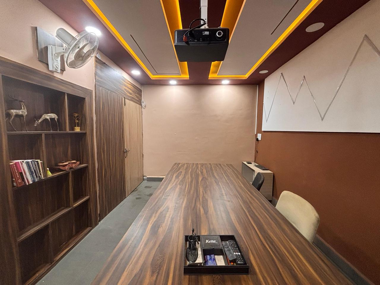 Classroom with projector and long table for live trading classes